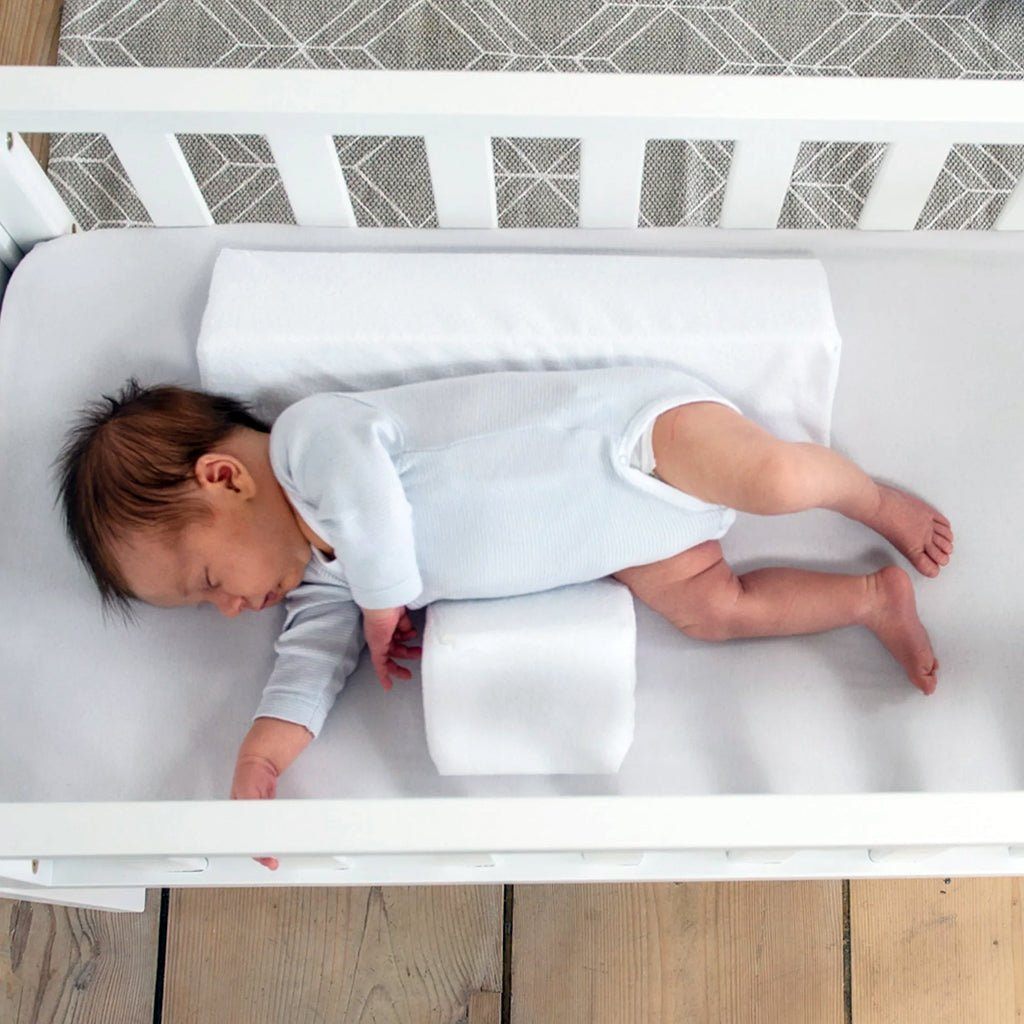 Pillow to help baby sleep best sale