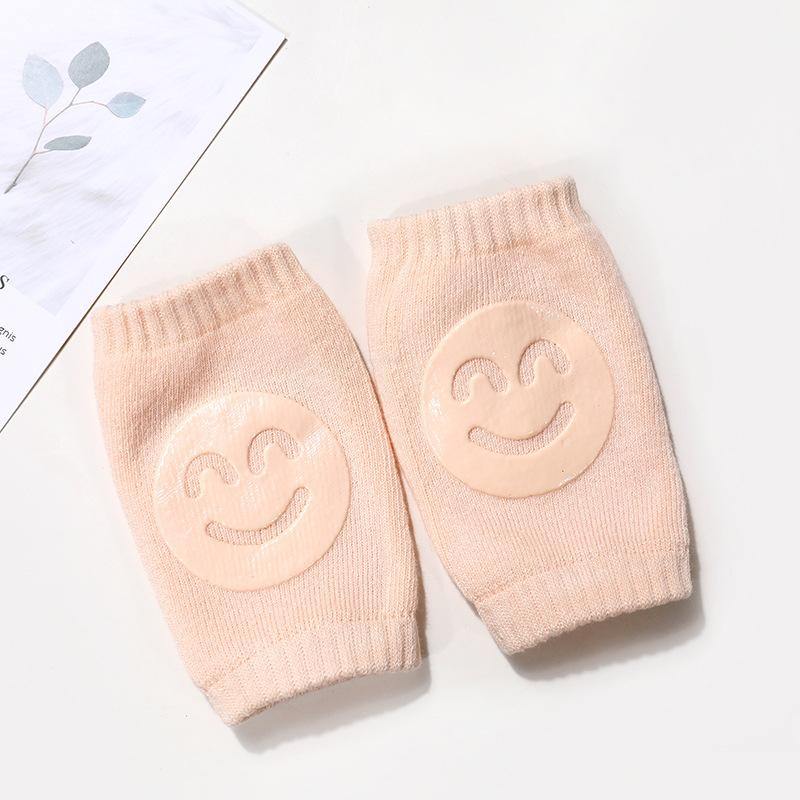 https://www.babybubblestore.com/cdn/shop/products/baby-crawling-anti-slip-knee-pad-baby-crawling-anti-slip-knee-pad-baby-bubble-store-peach-892338.jpg?v=1660128831